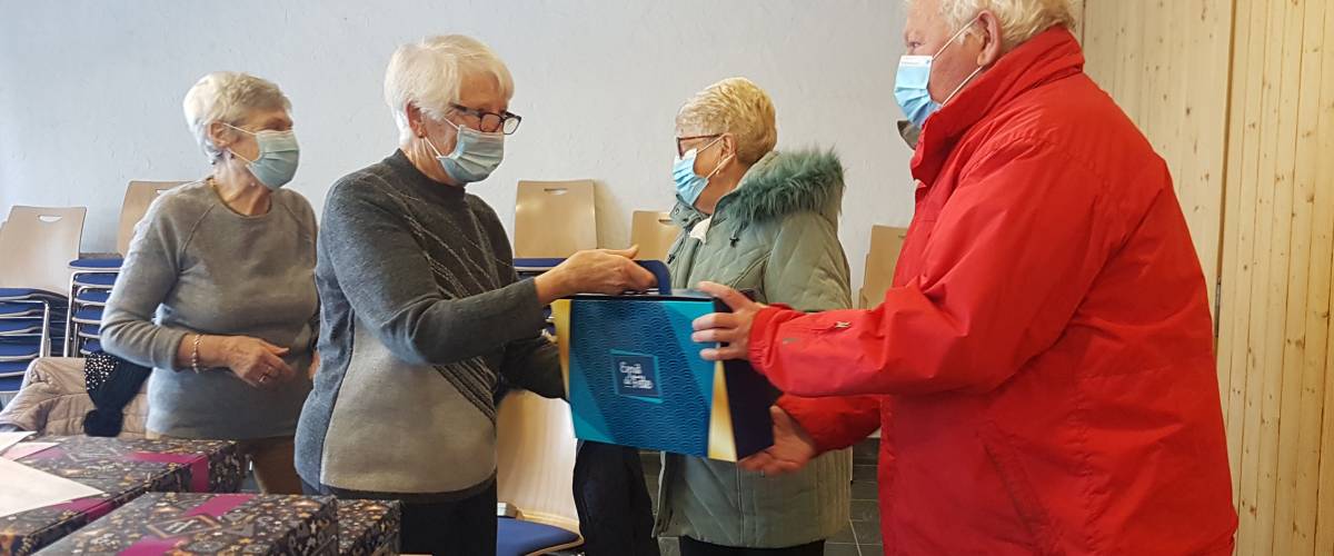 Remise des colis de Noël en main propre en 2021